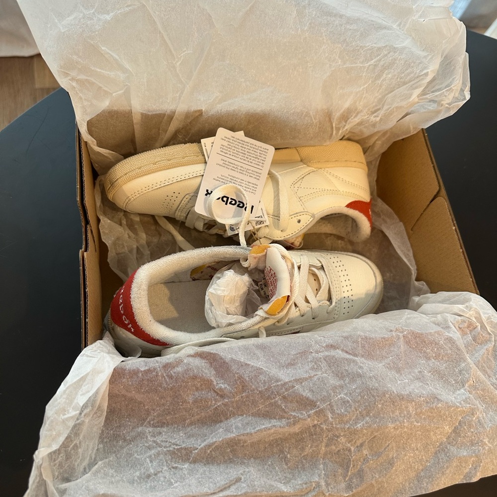 Reebok womens Sneakers in White and red.